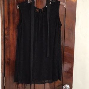 CAbi “Date Night” black top.  Size medium.